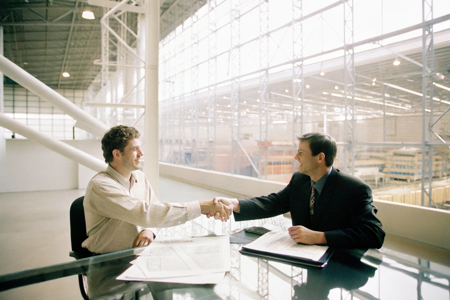 Business meeting discussing contract terms